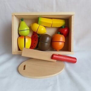 cutting fruit in wooden box