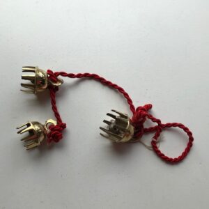 gold bells on red rope